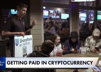 More businesses offer pay in cryptocurrency in a bid to lure young workers
